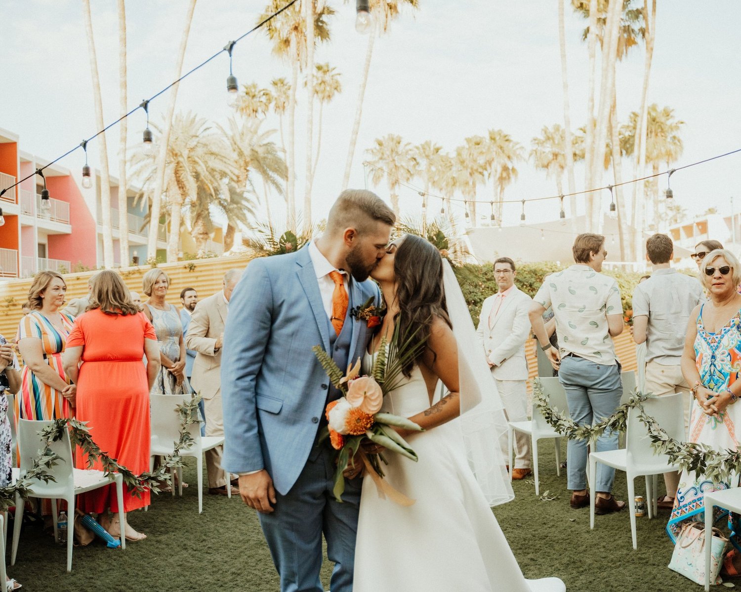 Beautiful wedding ceremony in Palm Springs, the perfect shot, newlyweds kissing